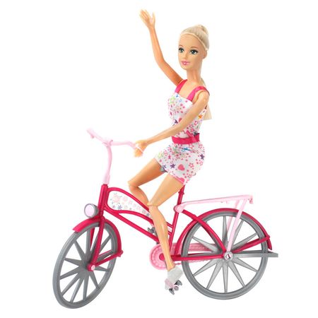 muñeca con bicicleta