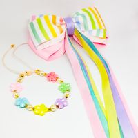 Set de niña Lazo Rosado Arcoiris y Pulsera Flores, Pitas Marialu Creaciones