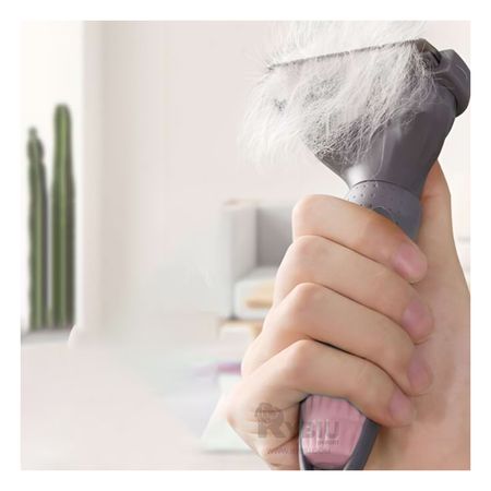 Cepillo Quita Pelos Pet Resistente en Color Rosado