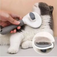 Cepillo con extractor de pelos para mascotas color gris