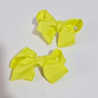 Par de ganchos amarillos para el cabello para niñas Aititi´s Kids
