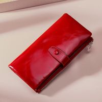 BILLETERA LARGA DE CUERO GENUINO