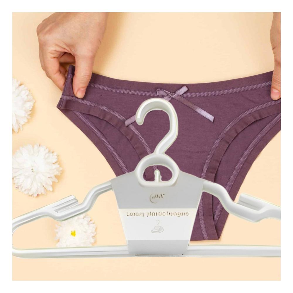 Gancho Blanco Plastico con Forma Circular Central de 4 Piezas Y+Papel Regalo