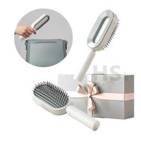CEPILLO PARA PEINAR CABELLO CON BOTON DE FACIL LIMPIEZA