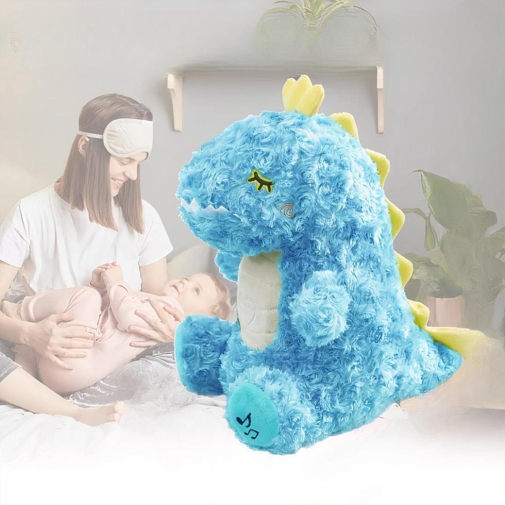 PELUCHE FELPA FORMA DINOSAURIO COLOR CELESTE.