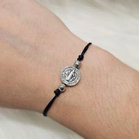 PULSERA SAN BENITO ACERADO CON HILO NEGRO