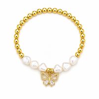 Pulsera Mariposa Perlas Doradas de acero enchapado en oro de 18k