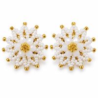 Aretes flor de luz tejidos